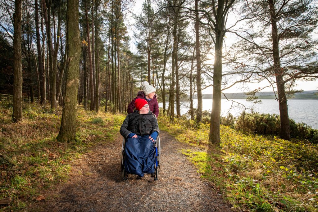 Users enjoy the accessible pathway at Derwent Waterside Park